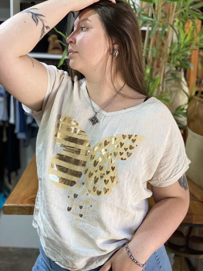 Blusa Florencia de Textura Natural con Alas en Foil Dorado